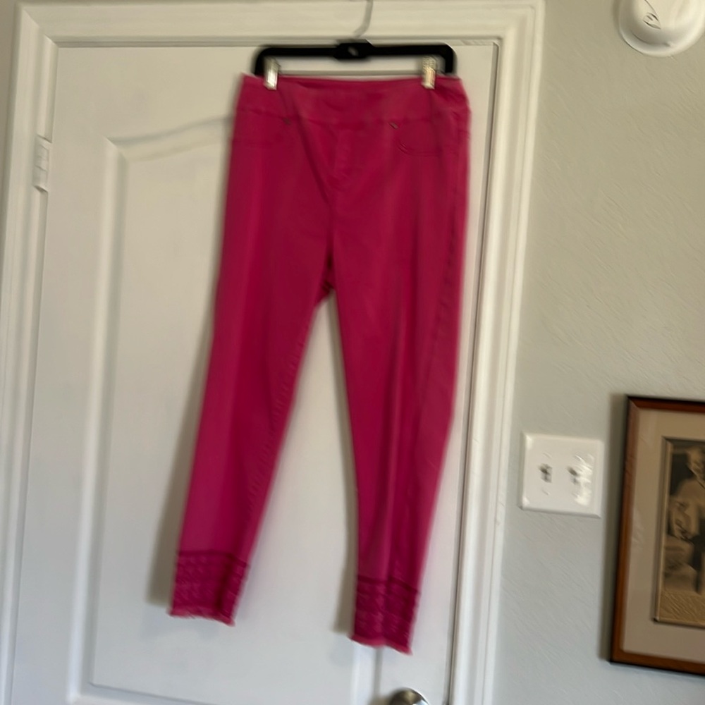Pink pull on Thin Her pants with functional back pockets and embroidered hems